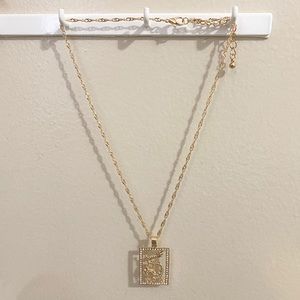 snake pendant with rhinestones | gold